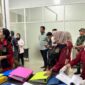 Penyidik Kejari Jambi  melakukan penggeledahan kantor PT EBN.