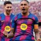 Penyerang Barcelona Raphinha (11) merayakan keberhasilannya mencetak gol ketiga ke gawang Sevilla pada pertandingan Liga Spanyol di Stadion Camp Nou, Spanyol, Minggu (15/3/2026) waktu setempat